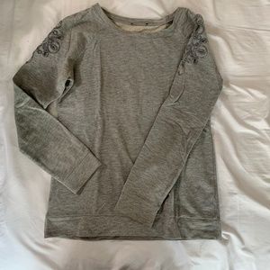 Grey sweater.